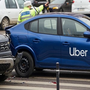 Car crash involving Uber vehicle, highlighting the importance of commercial insurance claims for rideshare accidents.- The Law Man Group, APC