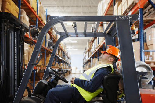 A man is sleeping in the wearhouse representing Job site Accident - The Law Man Group, APC.