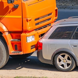 Commercial Vehicle accident with a car on the road